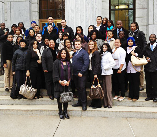 Group of people standing next to a building